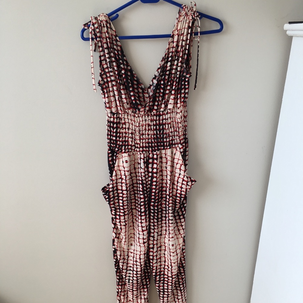 White,black and red jumpsuit